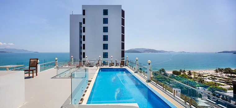 The outdoor swimming pool on the rooftop has views of the sea