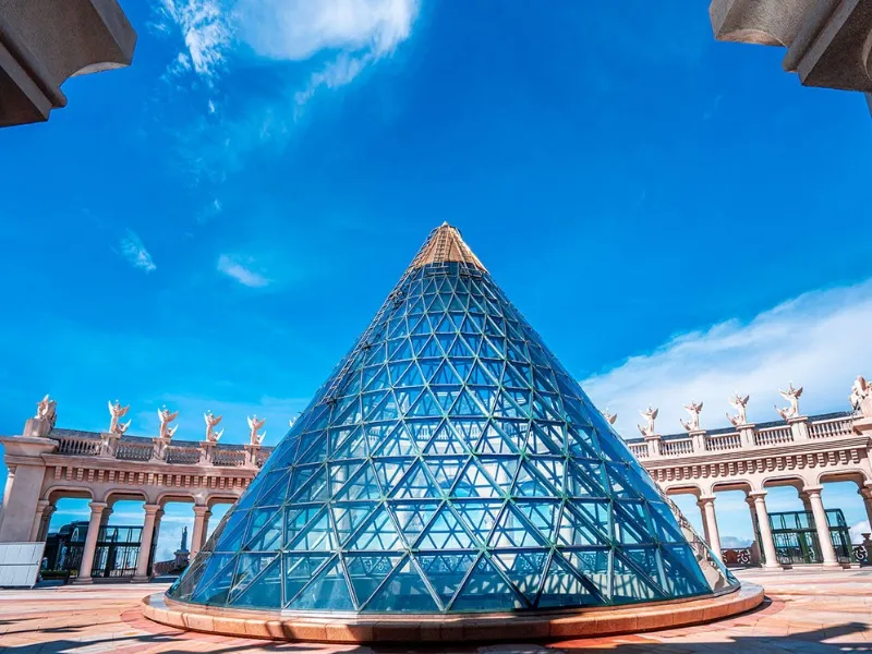 Eclipse Square at Ba Na Hills features Greek statues, a glass pyramid, and Renaissance-style corridors with stone pillars