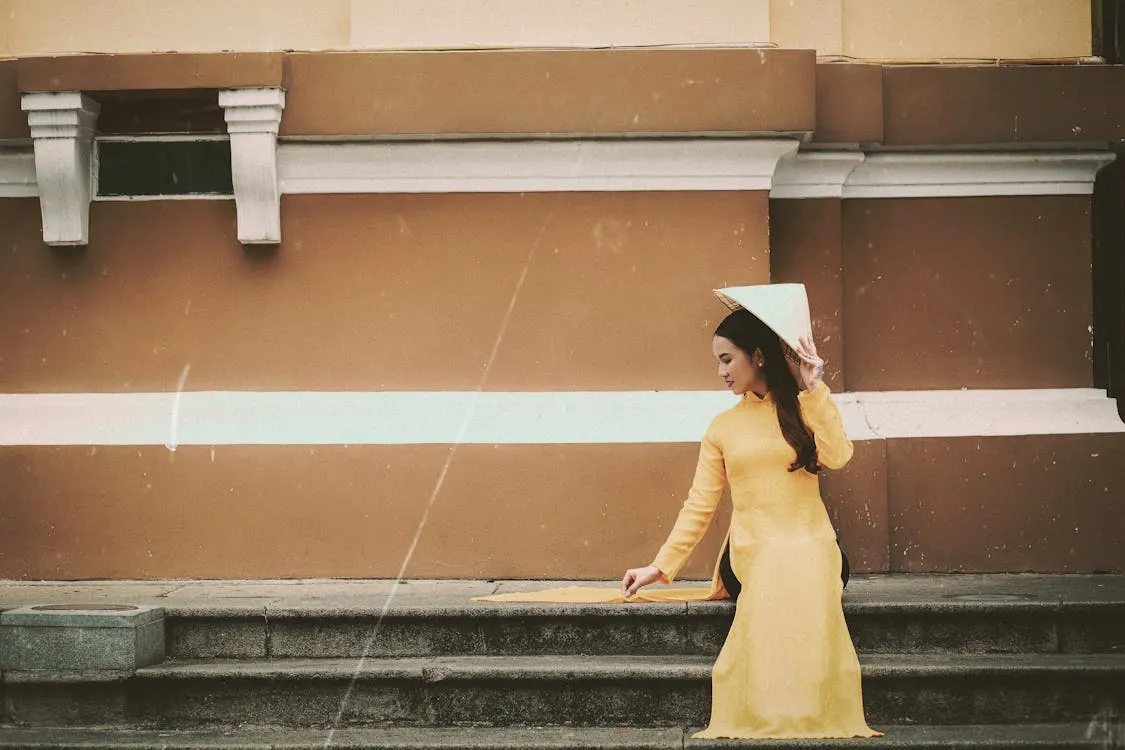 Visitors can buy traditional Vietnamese Ao Dai as a souvenir. - Photo Source: Pexels