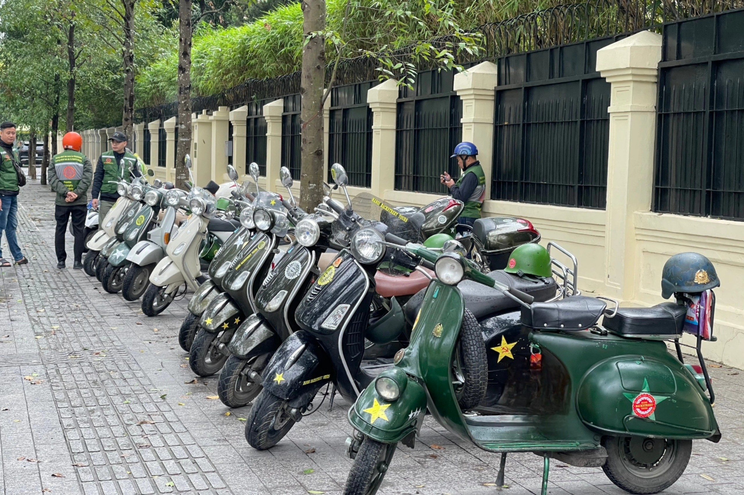 Day tour: Explore the suburban life and culture of Hanoi combined with a visit to Bat Trang pottery village on a military-style Vespa/Minsk motorcycle.